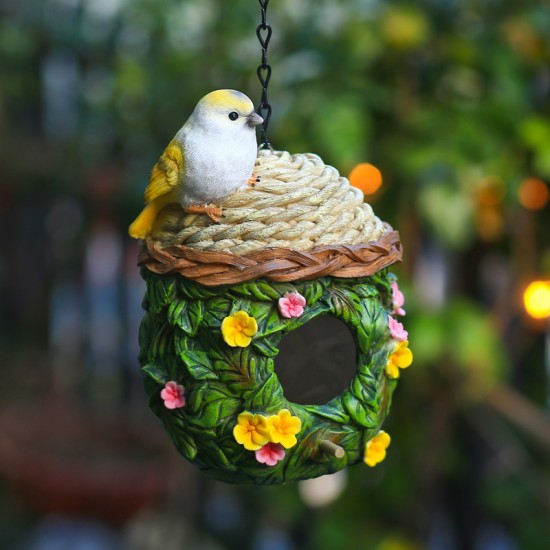 Parrot Outdoor Birdhouse with Resin Craftsmanship and Warm Insulation, Decorative Bird Nest for Garden Decoration.